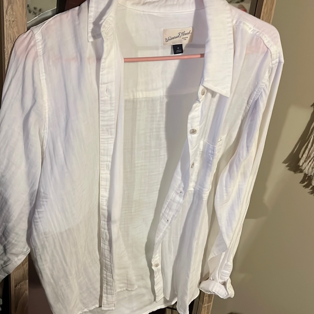 Button Up. Never worn, no tags.